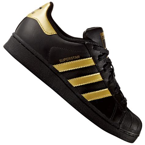 adidas schuhe schwarz gold sohle|Goldene Schuhe .